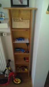 New shelf. This shelf fits perfectly in our little nook. Our daughter believes it's a place to keep her cars and trains, and so there you go. Photo: Laptops and Lederhosen